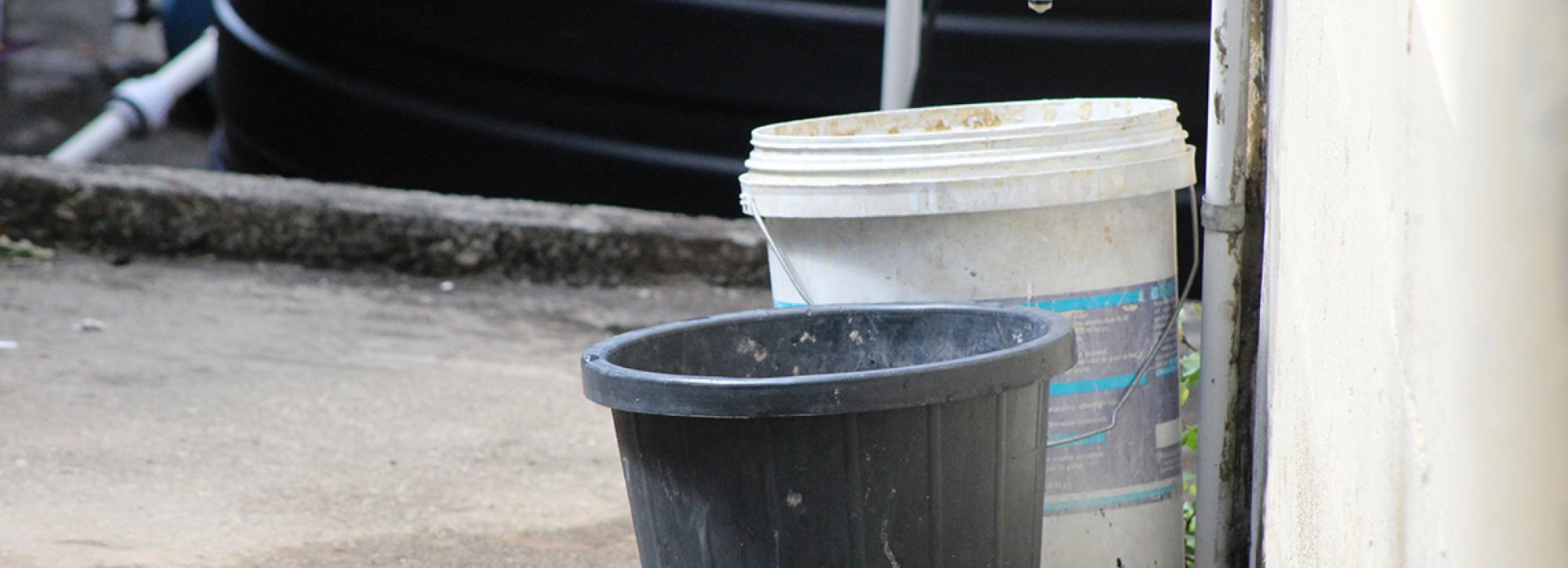 Buckets of water to show water supplies issue in the Caribbean