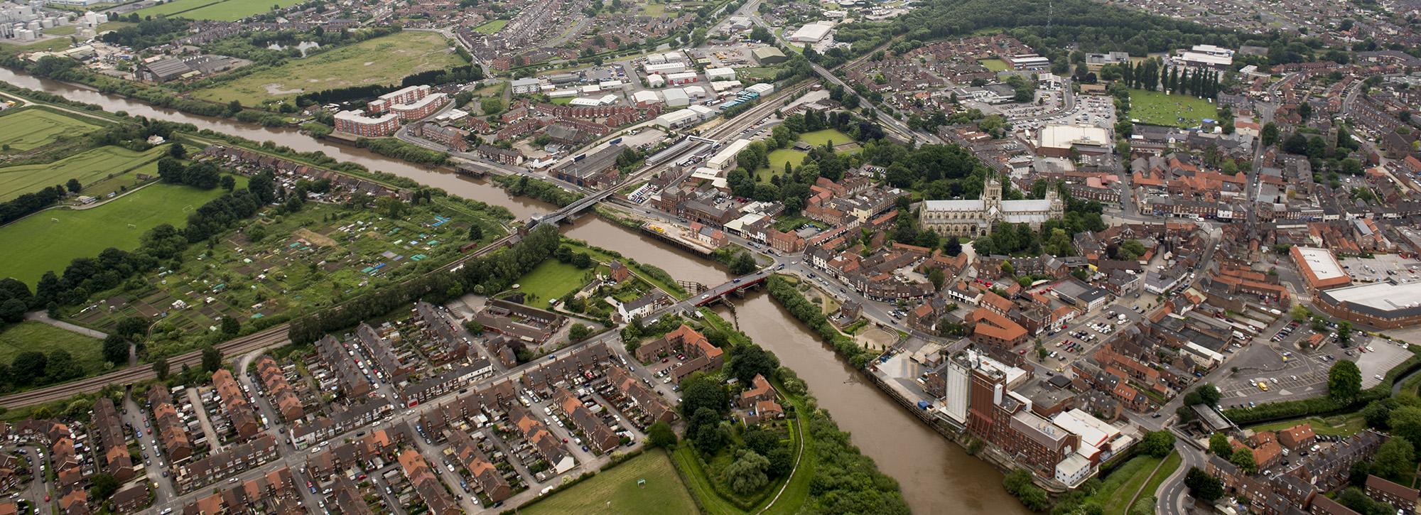 Aerial view of a town in catchment area for risk management