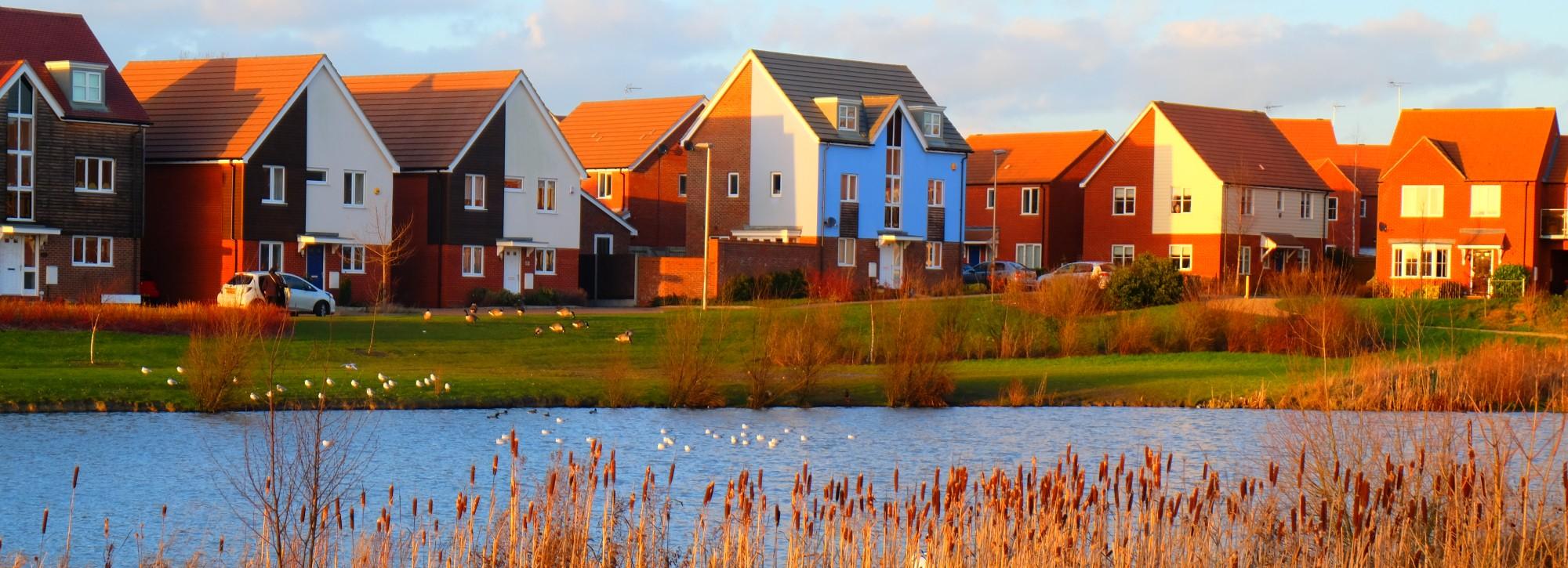 View of a row of houses with a suds in front