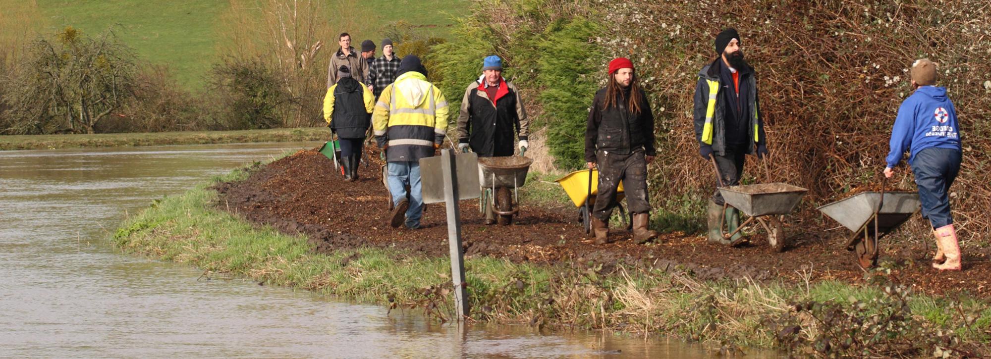 view of people helping during a flood event