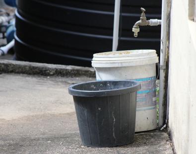 Buckets of water to show water supplies issue in the Caribbean