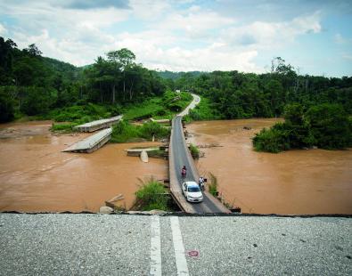 View of a bridge destroyed by flooding in Eastern Malaysia