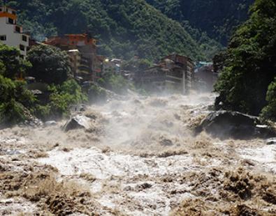 River floods in city in Peru, South America