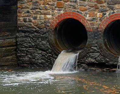 image of flow coming out of a brick combiner sewer