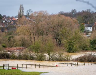flooded river in Northampton village after heavy rains