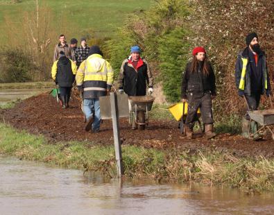 view of people helping during a flood event