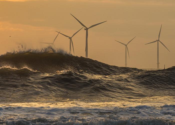 View of offshore wind farms in storm waves