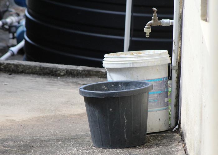 Buckets of water to show water supplies issue in the Caribbean