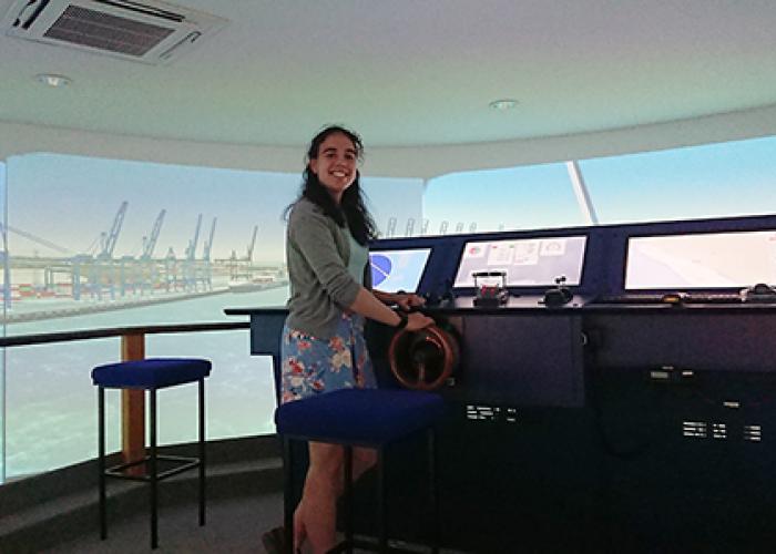 Picture of our female engineer, Jess, in our ship simulator