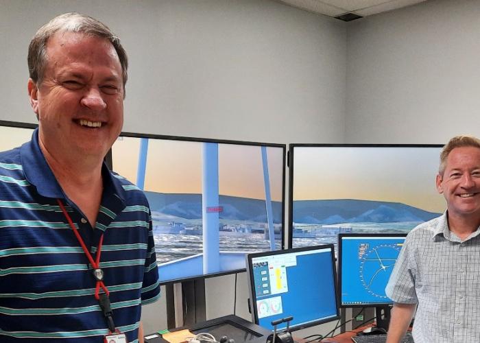 Pictures of HR Wallingford and USACE staff in ship simulator