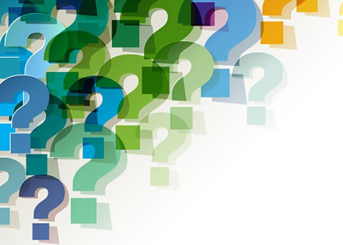 image of question marks in blue/green/orange colours on white background