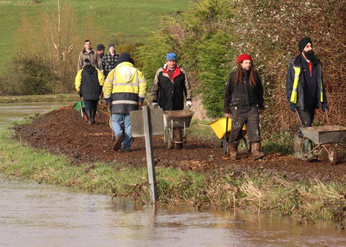view of people helping during a flood event