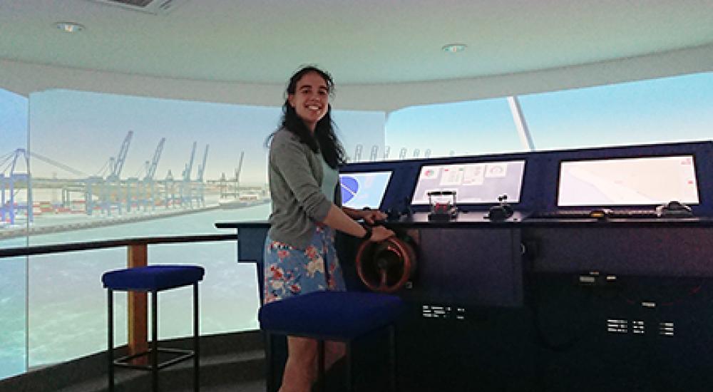 Picture of our female engineer, Jess, in our ship simulator