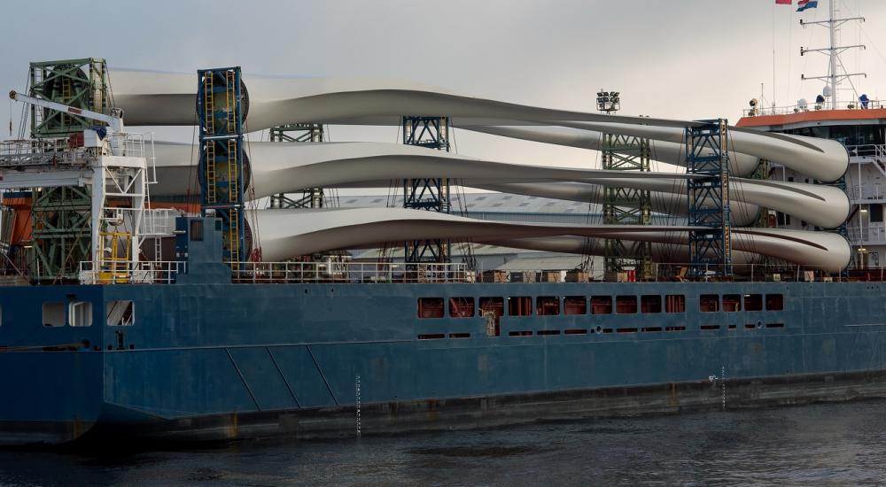 Ship loaded with wind turbines moored at a port