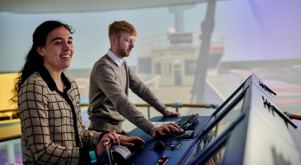 Female engineer, Jess, with her colleague in our ship simulator