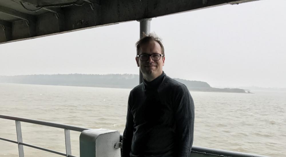 Scientist Richard Body on a boat on Yangtzee River
