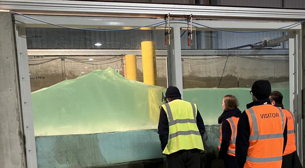 Researchers looking at tests going on in fast flume facilities in HR Wallingford
