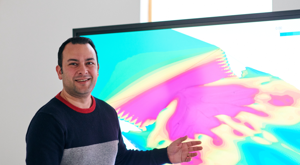 Picture of Sina with image on screen