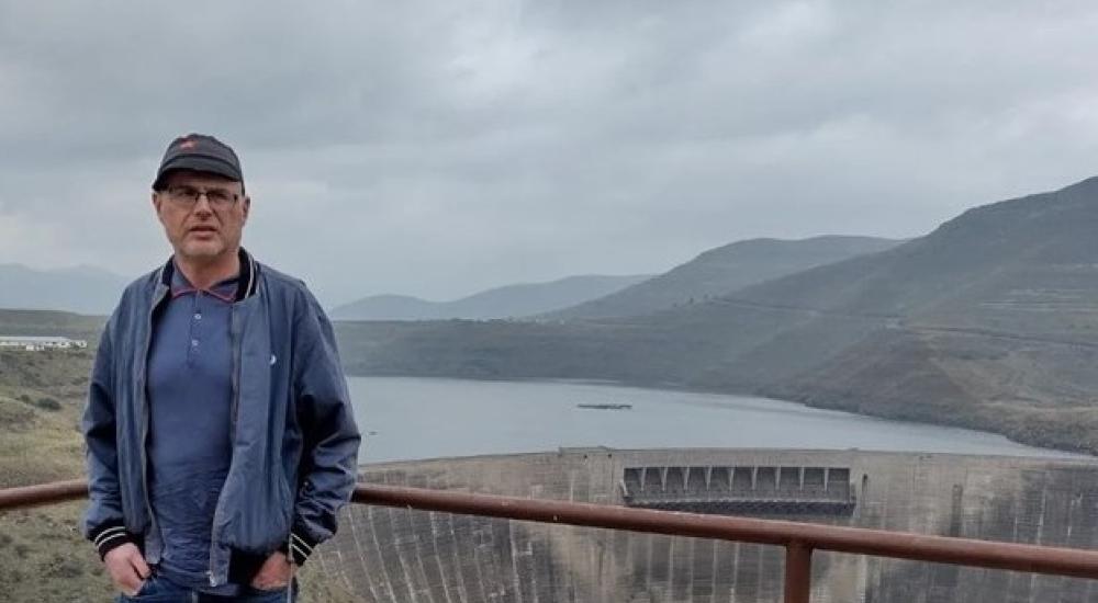 Darren Lumbroso in front of Katse Dam, Lesotho