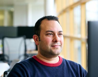 Headshot of CFD expert sitting at his desk, Sina Haeri