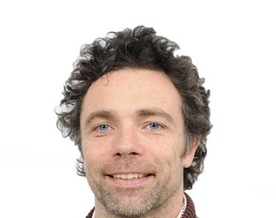 Headshot of Scientist Tom Benson