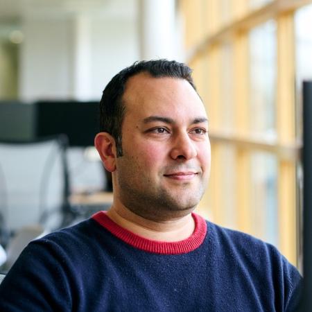 Headshot of CFD expert sitting at his desk, Sina Haeri