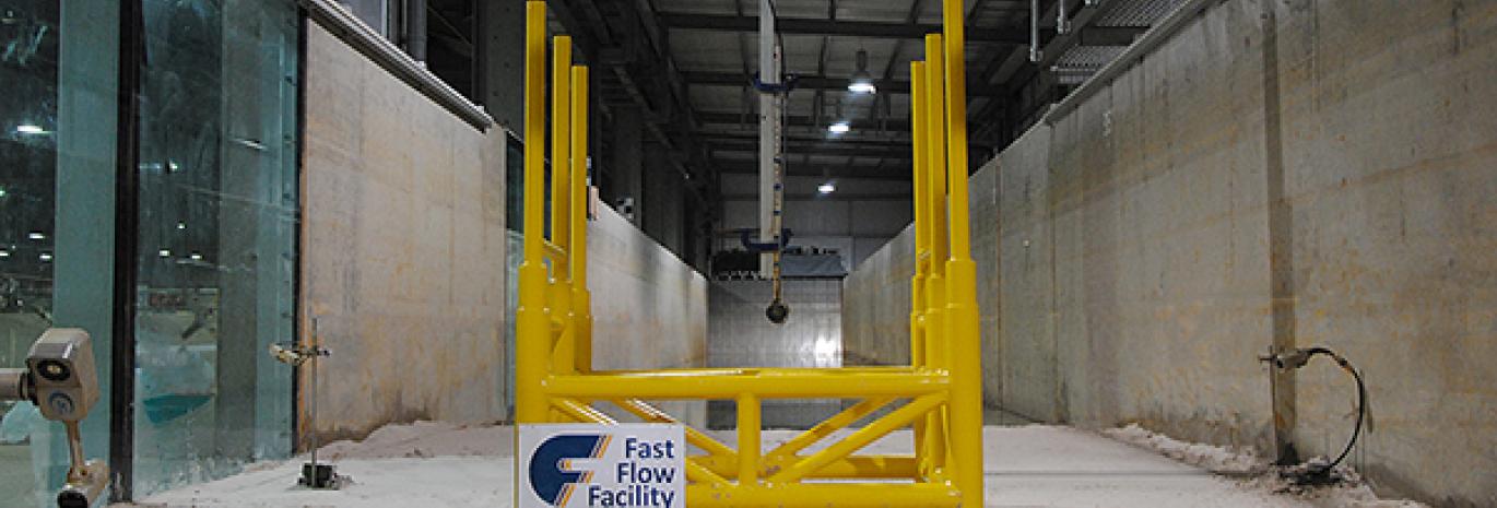 View of a wind farm substation painted in yellow in physical model