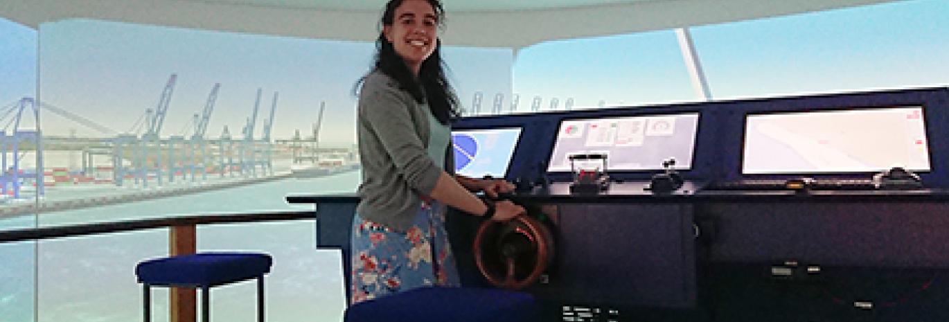 Picture of our female engineer, Jess, in our ship simulator