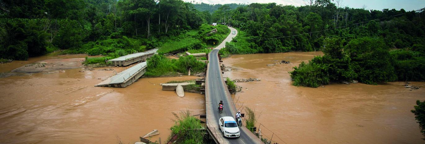 View of a bridge destroyed by flooding in Eastern Malaysia