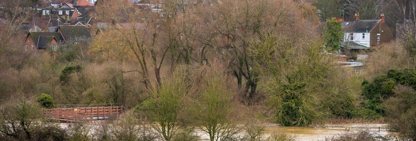 flooded river in Northampton village after heavy rains