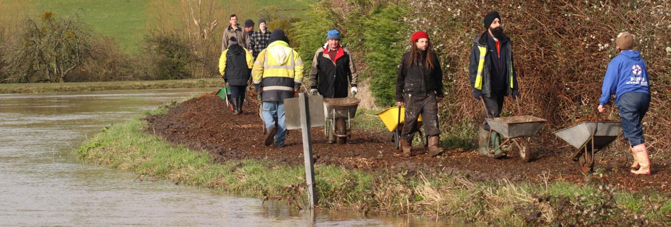 view of people helping during a flood event