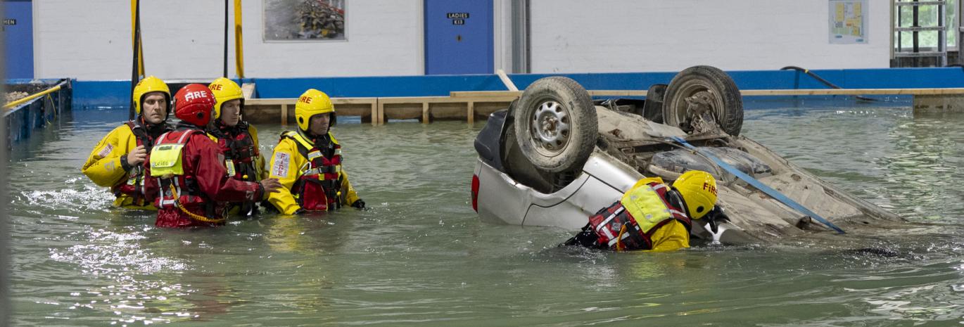 Group of rescue services in training in flooded basin