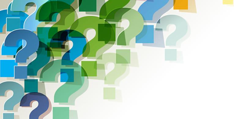 image of question marks in blue/green/orange colours on white background